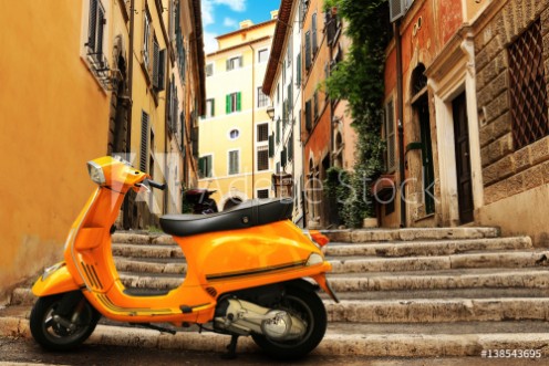 Picture of Orange vintage scooter on the background of Rome street